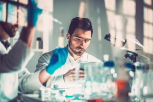 Young scientists in laboratory, research, technology.